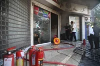 حریق یک مجتمع تجاری در خیابان شهید بهشتی تهران/ نجات ۲۰ نفر از حادثه